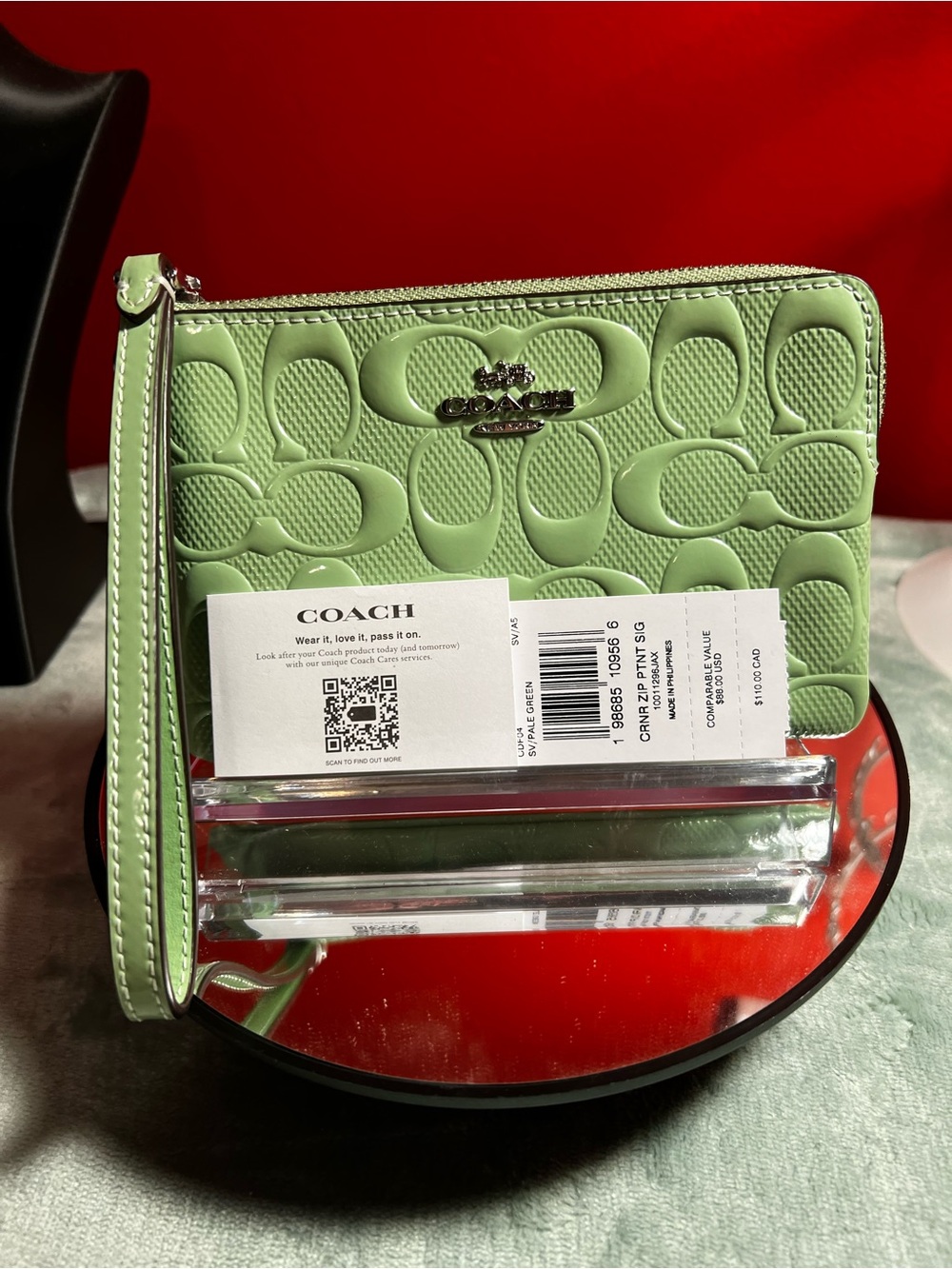 COACH Light Green Signature Embossed Wristlet